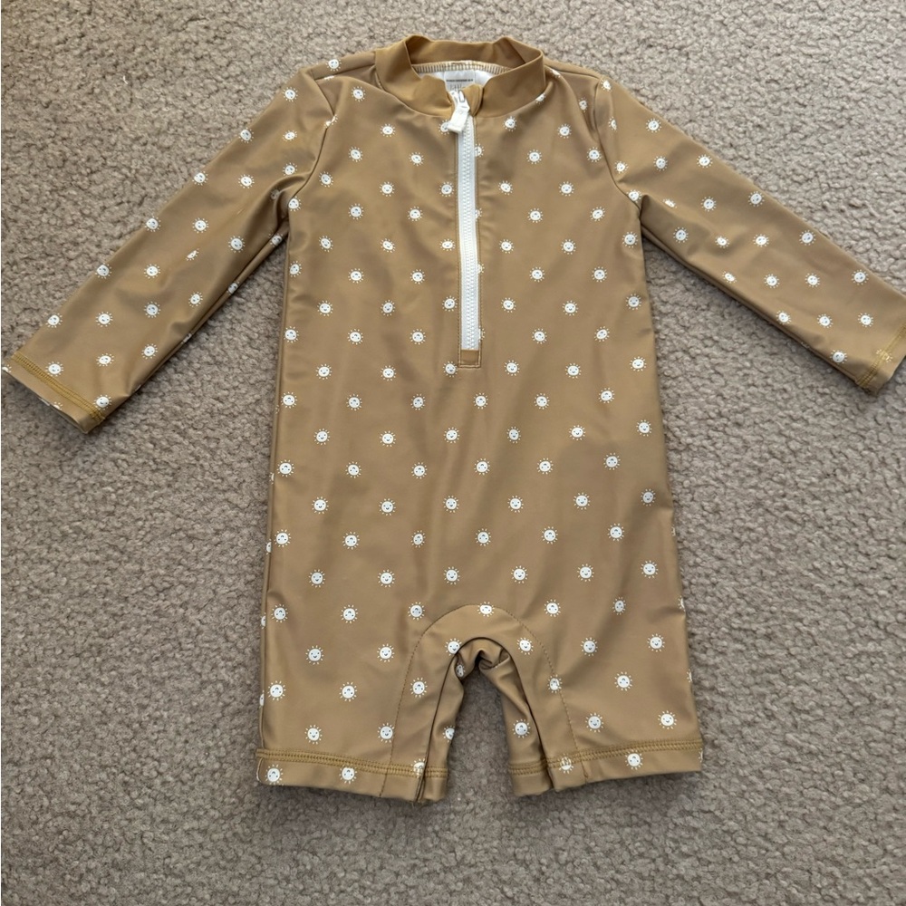Little planet sun print rash guard
